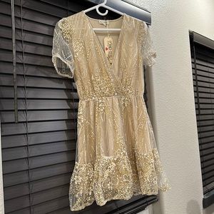 Beautiful, very sparkly cute champagne colored dress